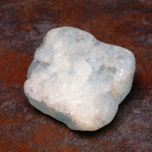 Raw Topaz crystal metaphysical properties, meanings, uses, benefits, healing energies, chakras